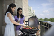 View Weber Q1400 Elektrogrill mit Stand, 43 x 32cm Grillfäche, portabler BBQ Grill, 2-geteilter porzellanemaillierter Guss-Grillrost, Aluminiumguss Deckel image 2