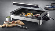 View WMF Lono Tischgrill elektrisch mit Glasdeckel, beschichtete Grillplatte, herausnehmbare Auffangschale, spülmaschinenfest, Edelstahl matt, 2200 Watt image 4