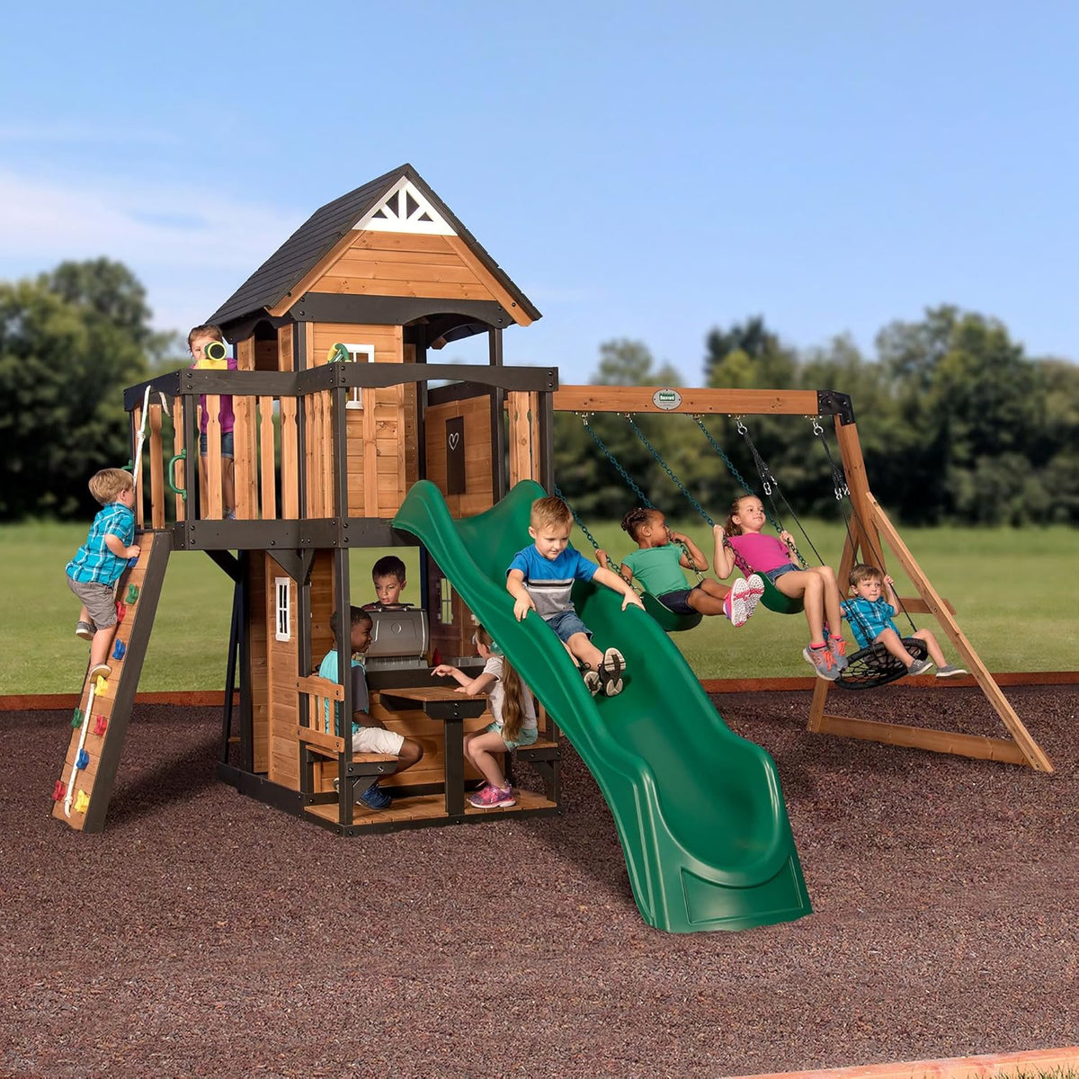 Backyard Discovery Canyon Creek Cedar Wood Swing Set with Wave Slide, Clubhouse, Play Kitchen, Picnic Area, Belt Swings, Web Swing, Rock Wall,